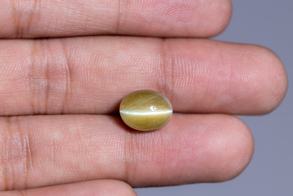 
                    
                      NATURAL CAT'S EYE (CHRYSOBERYL) 7.97  CARATS - Media 4
                    
                  
