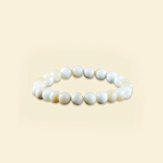mother of pearl bracelet, natural mother of pearl bracelet, soothing gemstone bracelet, harmony stone jewelry, gentle protection bracelet, emotional balance gemstone, daily wear spiritual bracelet, bracelet by acharya lavbhushan