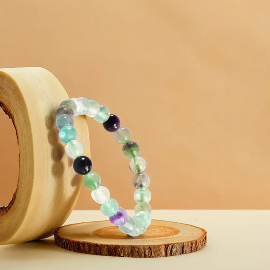 multi fluorite bracelet, natural fluorite stone bracelet, focus clarity bracelet, balanced energy crystal bracelet, grounding gemstone jewelry, emotional balance bracelet, daily wear gemstone bracelet, spiritual bracelet by acharya lavbhushan