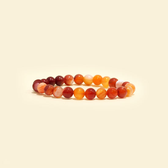 natural carnelian striped agate bracelet, carnelian agate gemstone bracelet, motivation confidence bracelet, grounding stone bracelet, striped agate crystal jewelry, emotional balance bracelet, daily wear gemstone bracelet, spiritual stone bracelet, by acharya lavbhushan