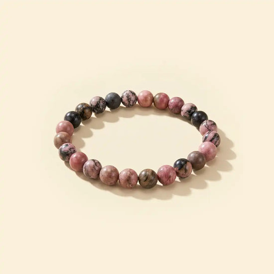 rhodonite bracelet, natural rhodonite stone bracelet, emotional healing bracelet, self-love balance bracelet, grounding crystal jewelry, emotional balance gemstone, daily wear gemstone bracelet, spiritual bracelet by acharya lavbhushan