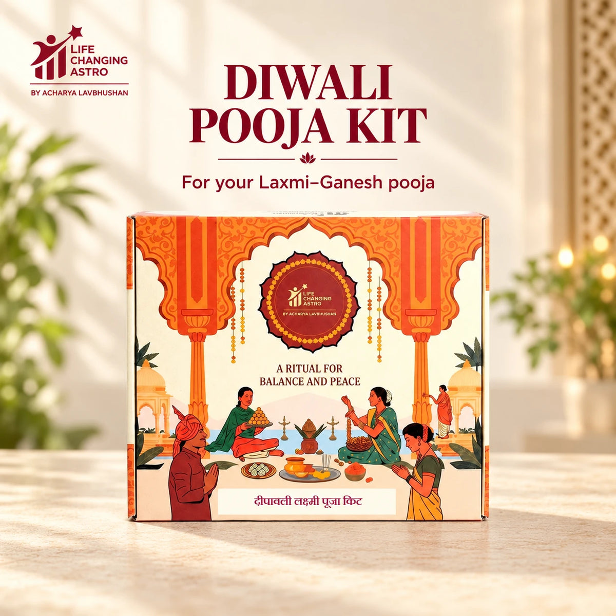 Diwali Pooja Kit. Orange and ivory product box on a warm stone surface.