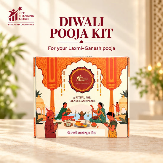 Diwali Pooja Kit. Orange and ivory product box on a warm stone surface.