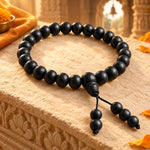 
                    
                      Natural Karungali Bracelet on warm sandstone
                    
                  