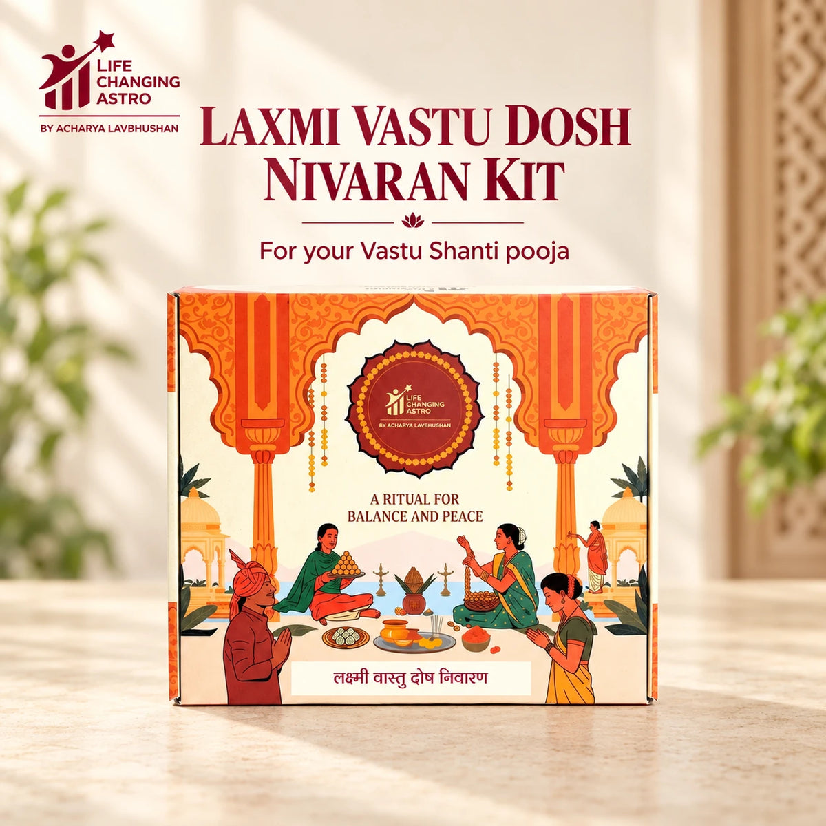 Laxmi Vastu Dosh Nivaran Kit. Orange and ivory product box on a warm stone surface.